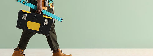 Worker Carrying Tools