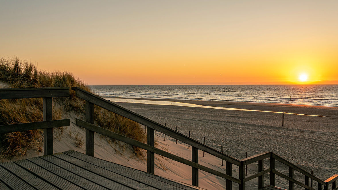 Strand zonsondergang