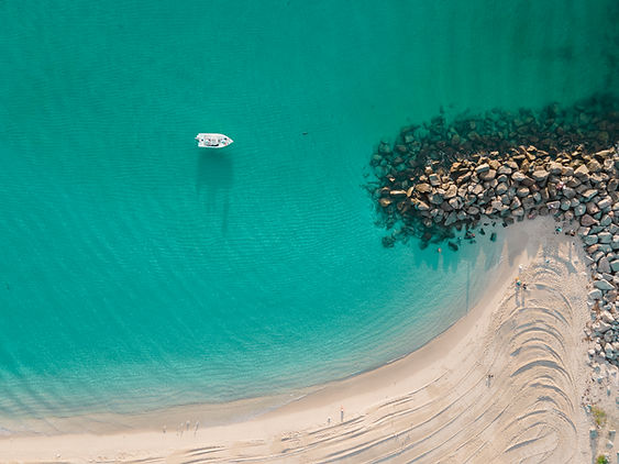 Boat on Turquoise Water