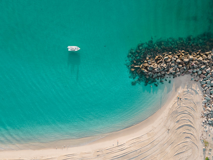 Boat on Turquoise Water