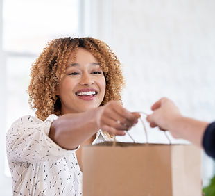 Woman Giving Bag