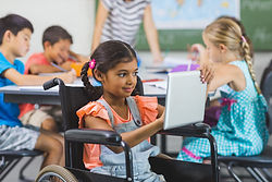 Schoolgirl Using Tablet