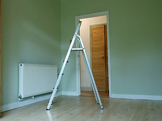 Interior of newly decorated flat with step ladder