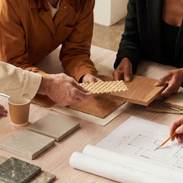 Secure File Sharing Best Practices for Regulated Industries - people collaborating around a worktable