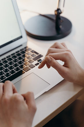 Hands Using Laptop