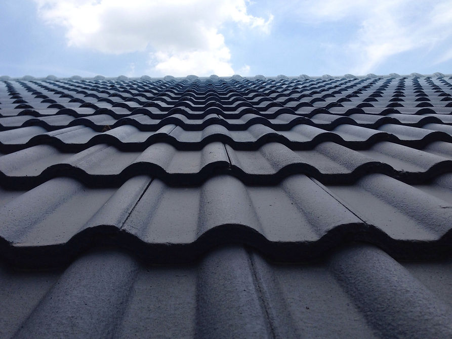 close-up image of black roof tiles