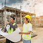 Two staff at a constuction site