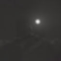 Standing under full moon