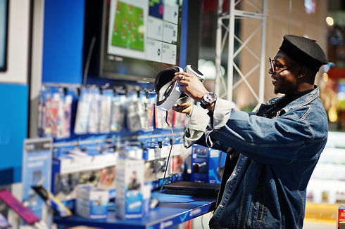 VR Headset being looked at by a man
