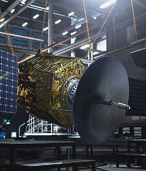 Engineer Inspecting Satellite