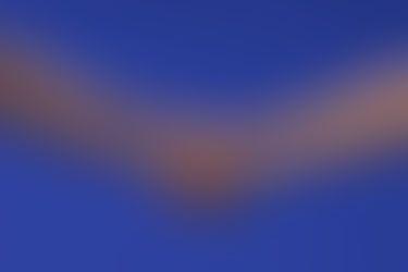 blue background with the forefront of arms and hands of a woman and a man in a handshake