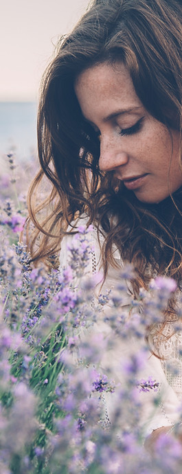Woman journaling and reframing her relationship with time through self-love coaching