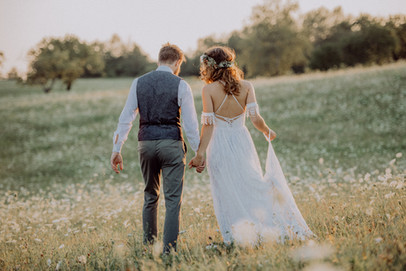 Bride and groom at a scenic outdoor ceremony