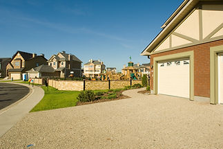 A resin driveway leading to a garage