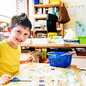 Child painting in school