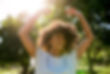 woman dancing happy in the sunshine, healing and breaking free from trauma
