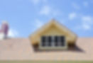 roof window, chimney and blue sky as background