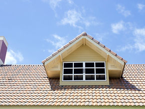 A tiled roof with dormer section