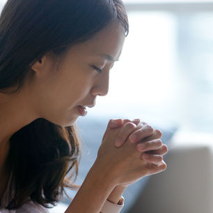 An woman spending time in prayer.