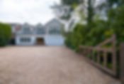 front view of a house with driveway