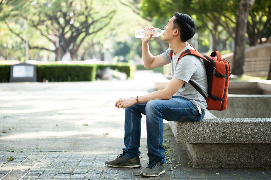 a man drinking water