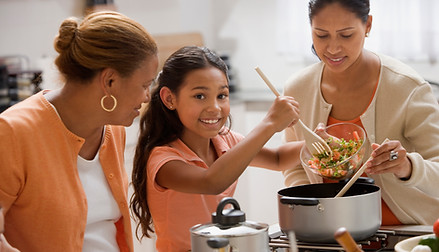 Mother and Daughters Cooking