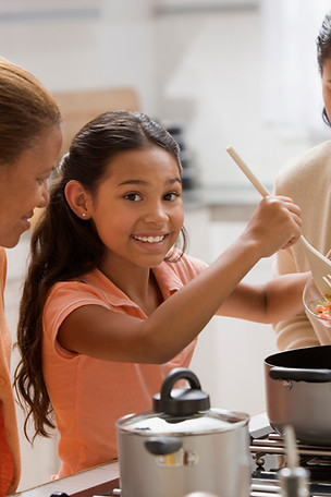 Mother and Daughters Cooking