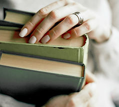 Hands Holding Books