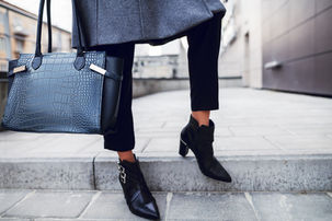 A woman in black pants