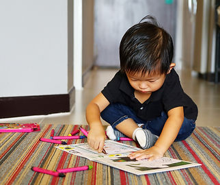 Little Boy with Crayons