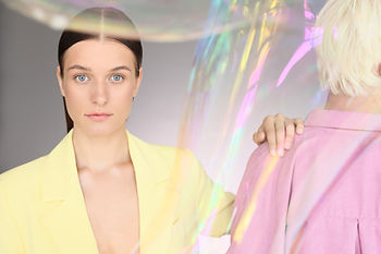 Men in blouses are today's women in suits.