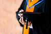 Graduation Cap Holding