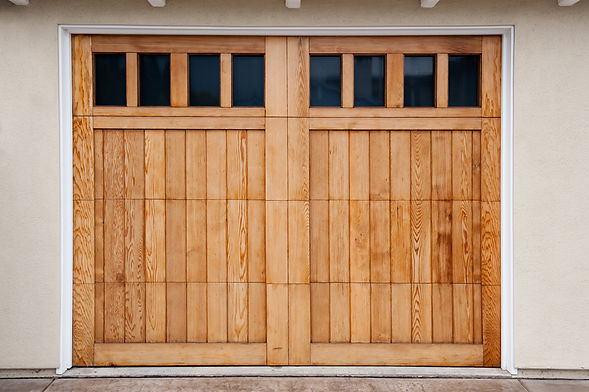 Carriage style garage doors of a contemporary home