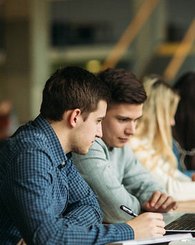 Students looking at Screen