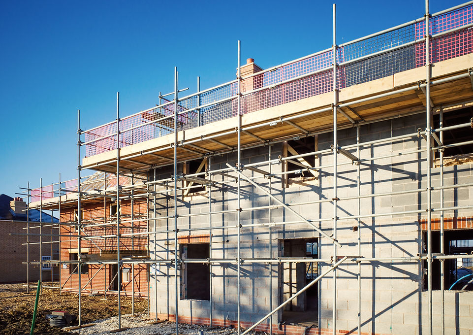 Residential house development in Newport featuring extensive exterior scaffold structures