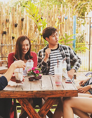 young people enjoy themselves in a cafe'