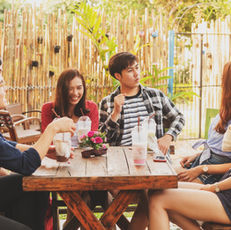 young people enjoy themselves in a cafe'
