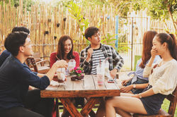 young people enjoy themselves in a cafe'