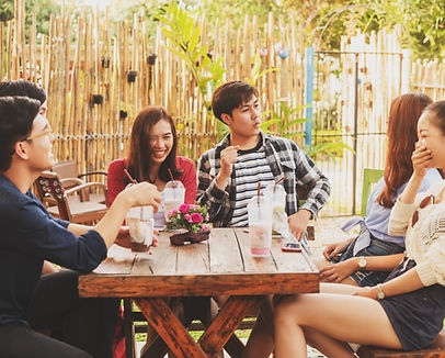 young people enjoy themselves in a cafe'