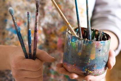 Artist with Paintbrushes