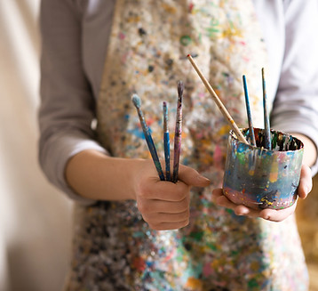 Artist with Paintbrushes