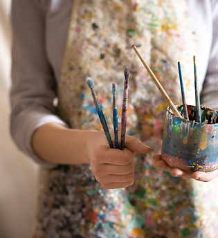 Artist with Paintbrushes