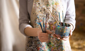 Artist with Paintbrushes