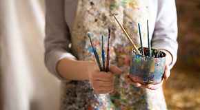 Artist with Paintbrushes