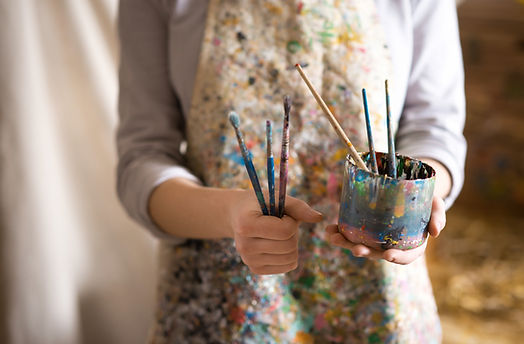 Artist with Paintbrushes