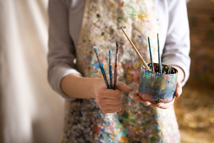 Artist with Paintbrushes