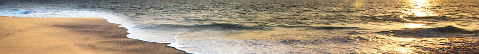 Om Symbol on the Beach