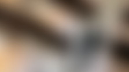 Overhead photo of students standing in a Library