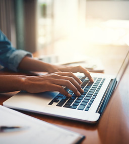 Typing on Laptop