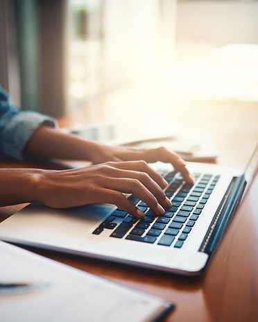 Typing on Laptop